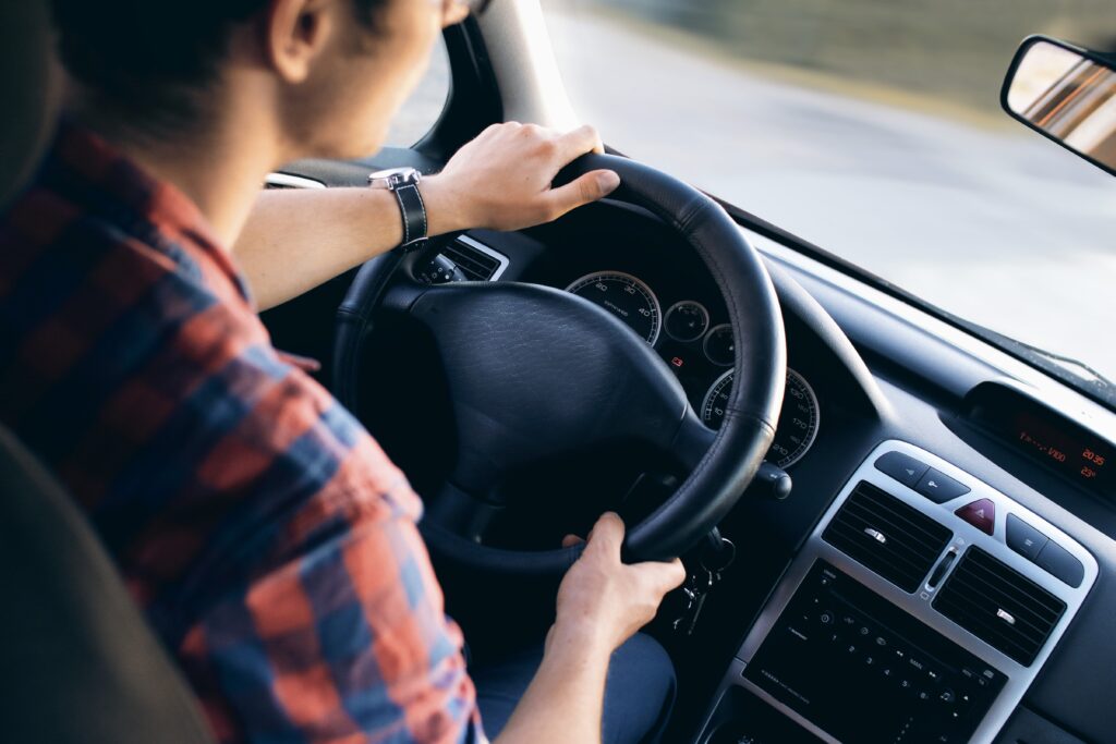 A man practicing undistracted driving to prevent a car accident