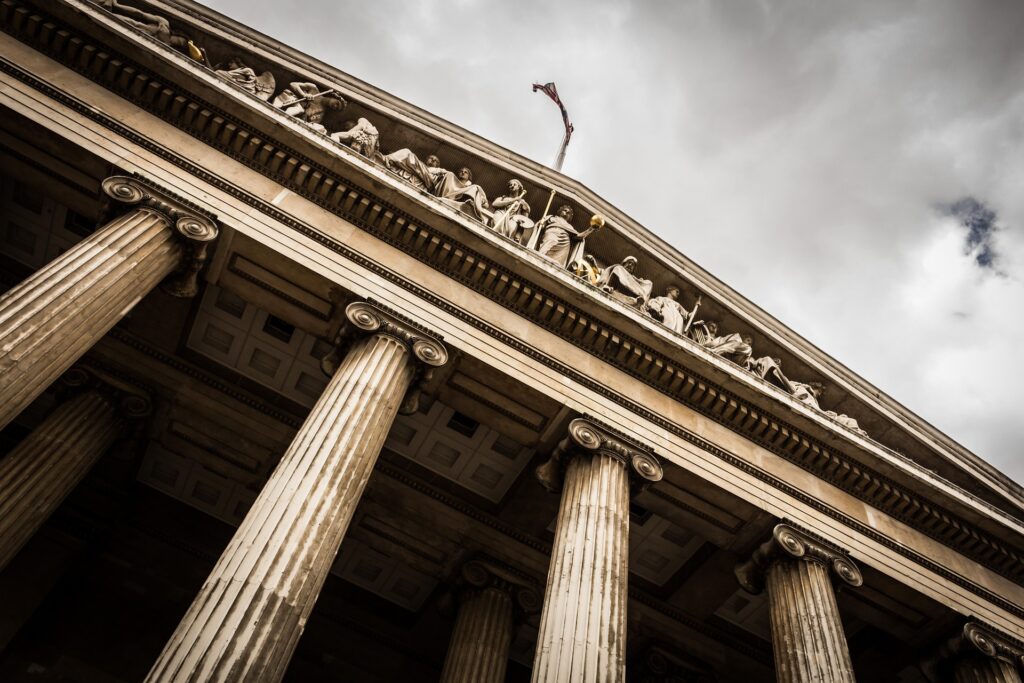 close up shot from below the U.S. Supreme Court during a cloudy day