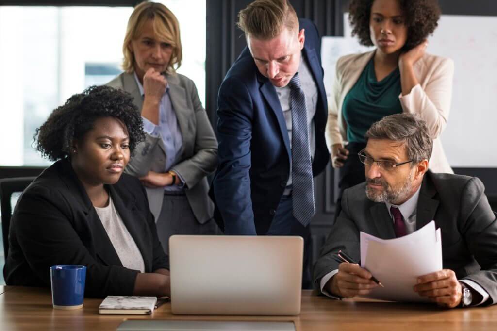 A diverse group of employees having a discussion