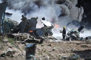 A fireman responds to an airplane crash