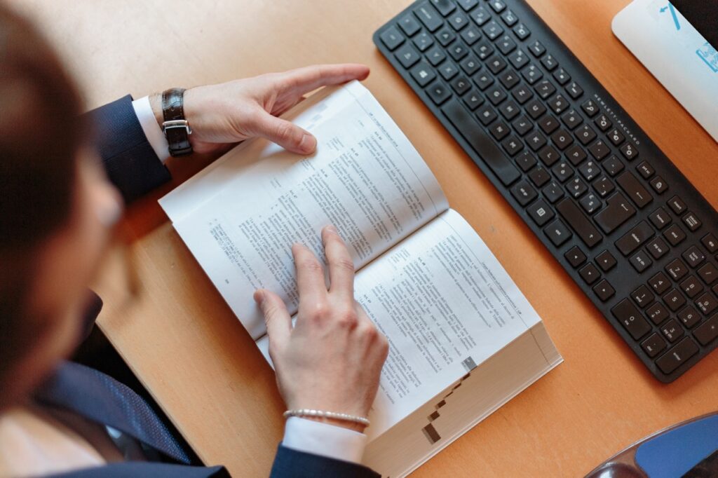 A man reading a law book