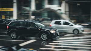 speeding SUV risking a car accident