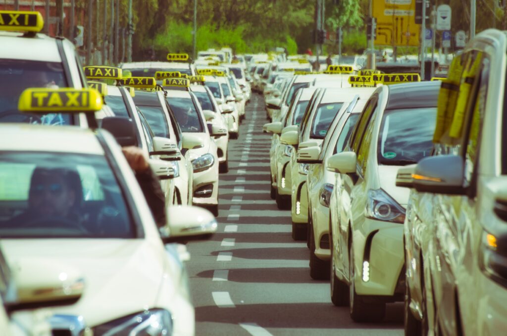 two lanes of taxis stuck in traffic